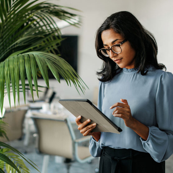 A woman watches the Affluent Investor Seminar.