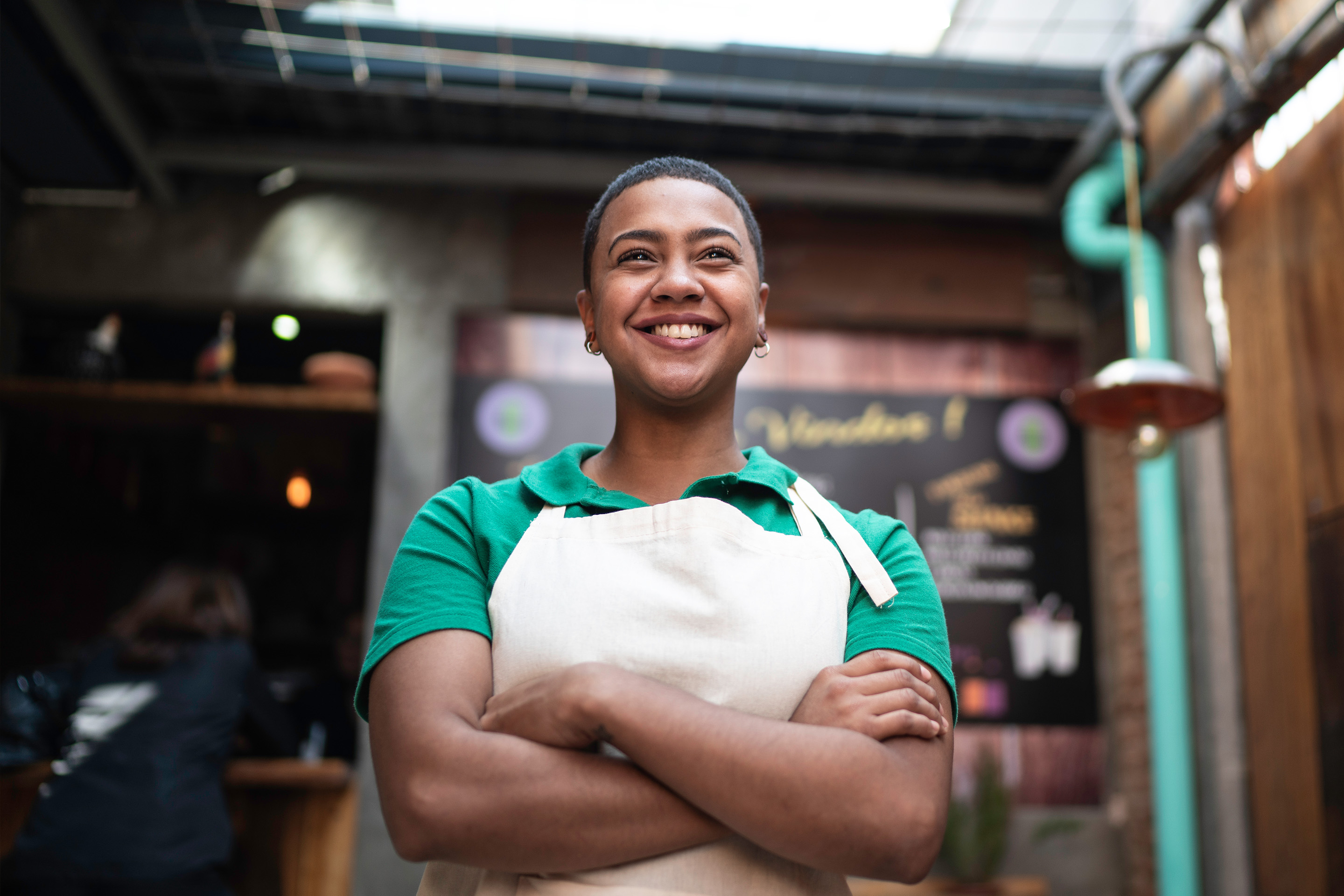 A woman works in a cafe.