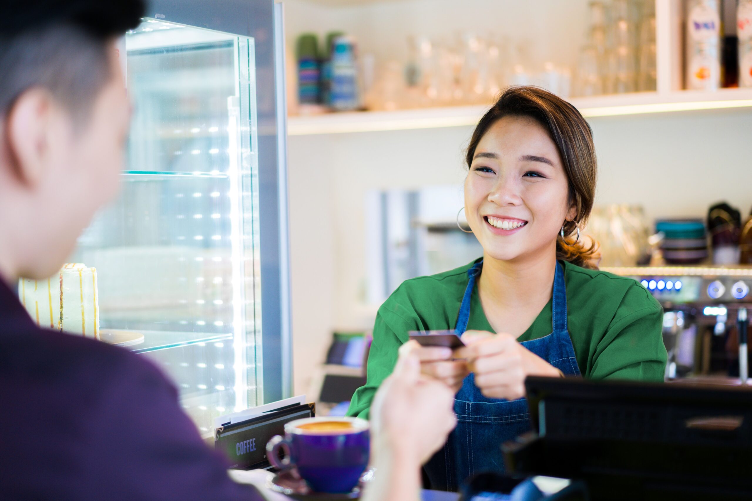 Asian lady working at cashier