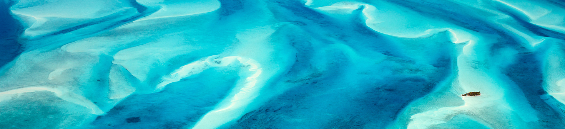 A beach with a boat.