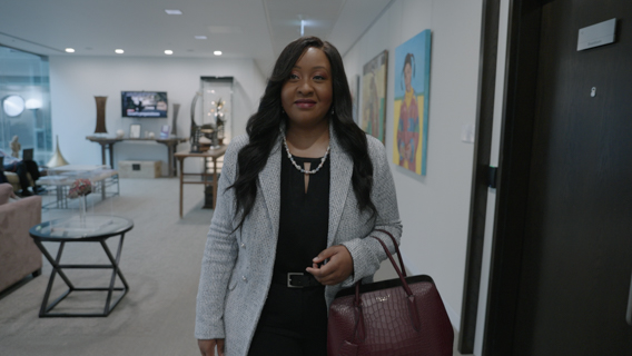 A person with a bag walking