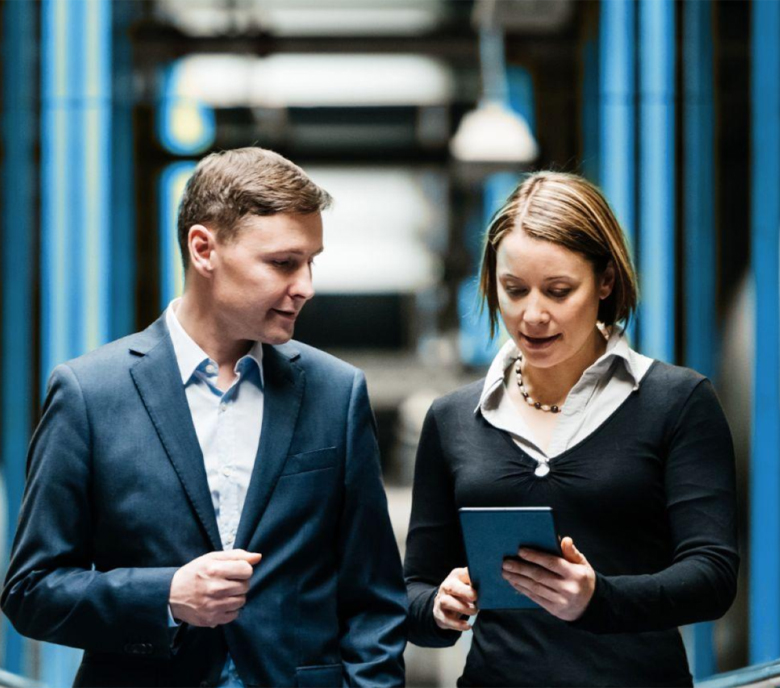 Colleagues with iPad