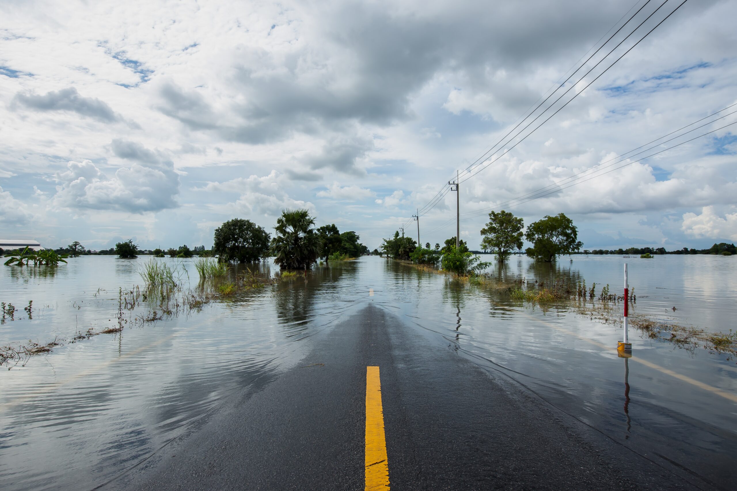 Flood water on either sides of the road