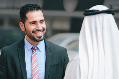 Businessmen talking about beliefs and innovation