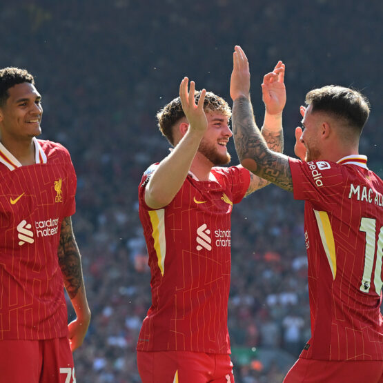 Liverpool players high five.