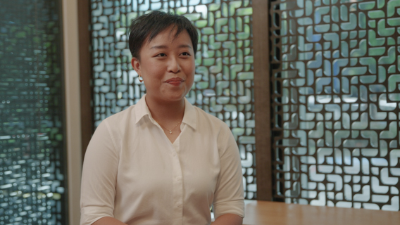 lady smiling in a white shirt