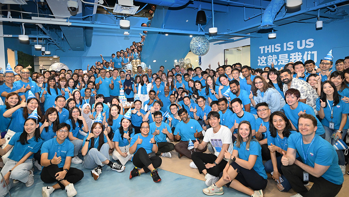 Trust bank staff celebrate together