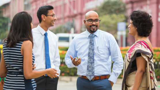 Our_culture_happy_colleagues_outside