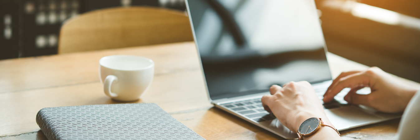 Laptop on wooden table