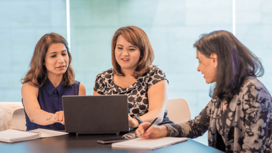 Three women in a meeting